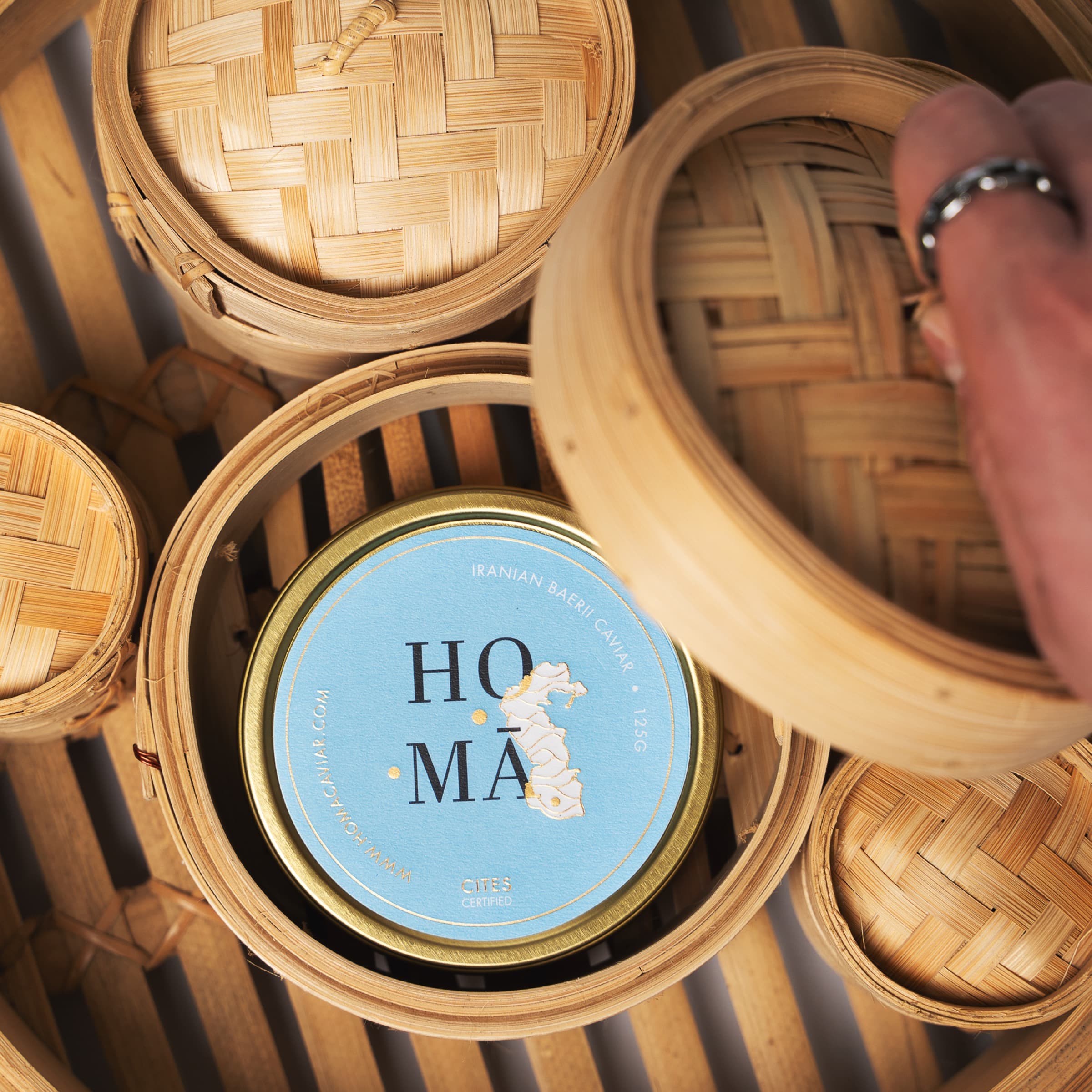 HOMĀ caviar with dim sum steamer